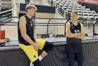 L.Beliauskas pranoko M.Kuzminską