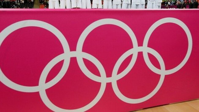 Olimpiadoje ir toliau rungtyniaus dvylika krepšinio rinktinių (Scanpix)