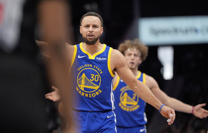 S.Curry pataikė 5 tritaškius (Scanpix nuotr.)
