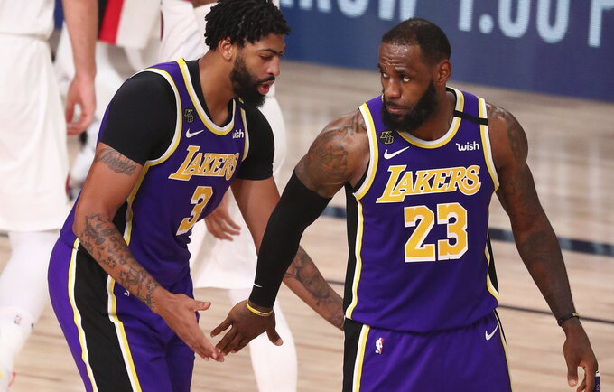 NBA klubų laukia itin neįprastas sezonas (Scanpix nuotr.)