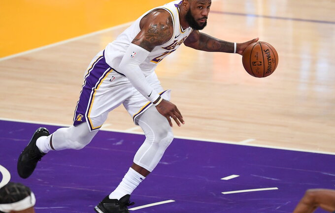 L.Jamesas NBA sužaidė 1300 rungtynių (Scanpix nuotr.)