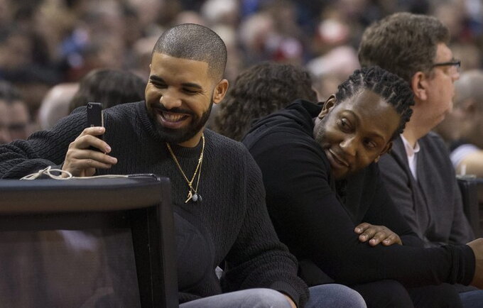 Ar tikrai Drake'as nesutrukdė J.Holiday'ui? (Scanpix nuotr.)