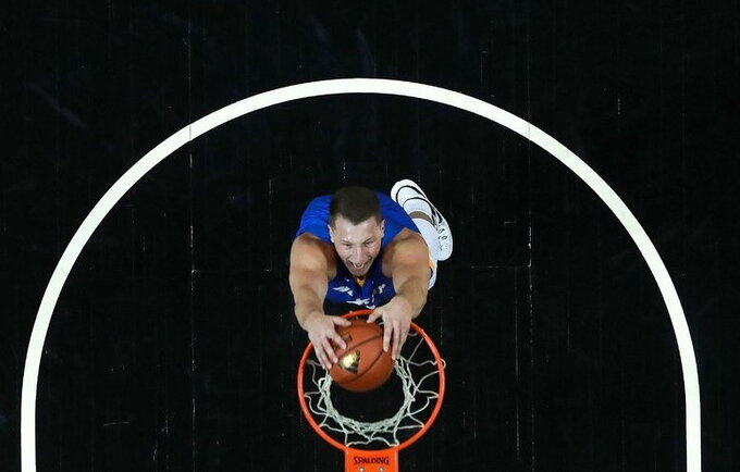 R.Gustys atkovojo net 23 kamuolius (Scanpix nuotr.)