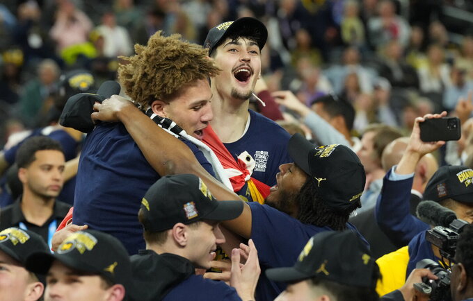 Mičigano universitetas triumfuoja NCAA po ilgų metų pertraukos (Scanpix nuotr.)