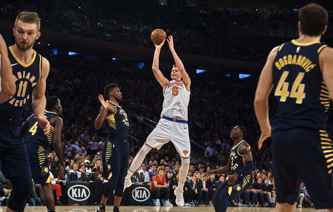 K.Porzingis užstojo prancūzą (Scanpix nuotr.)