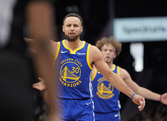 S.Curry pataikė 5 tritaškius (Scanpix nuotr.)