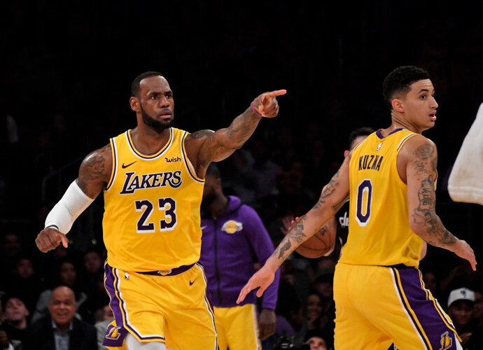 L.Jamesas atidarys NBA sezoną (Scanpix nuotr.)