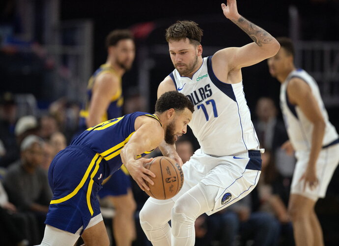 L.Dončičius susitvarkė su S.Curry iššūkiu (Scanpix nuotr.)