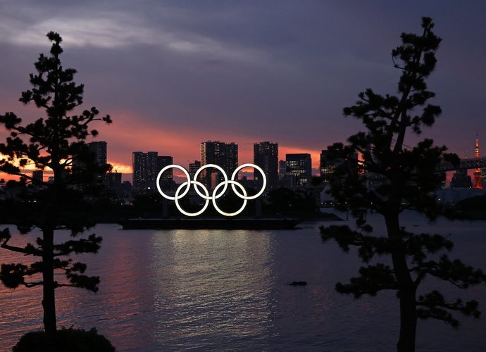 COVID-19 atvejai kelia grėsmę olimpiadai (Scanpix nuotr.)