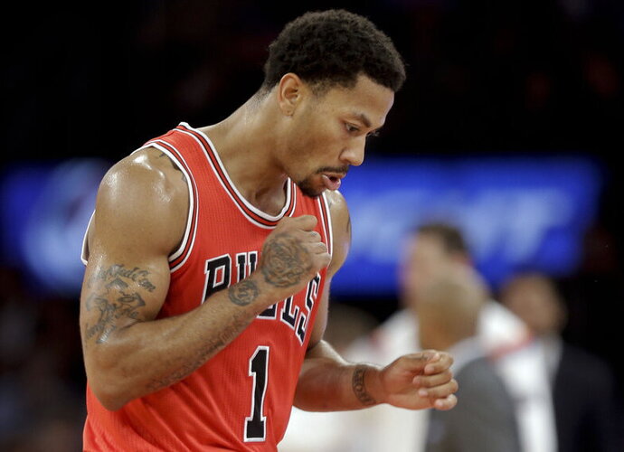 D.Rose'as bus pagerbtas Čikagoje (Scanpix nuotr.)