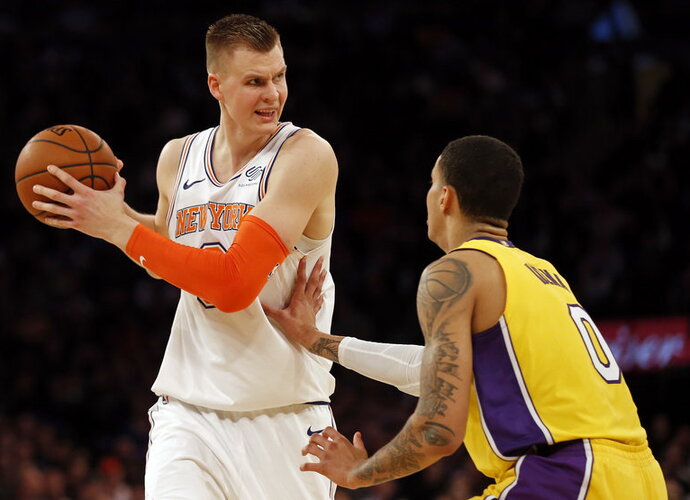 K.Porzingis itin produktyviai rinko taškus (Scanpix nuotr.)