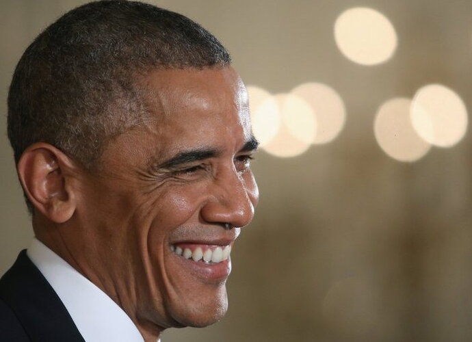 B.Obama liepė M.Jordanui daugiau dėmesio skirti NBA klubui (Scanpix nuotr.)