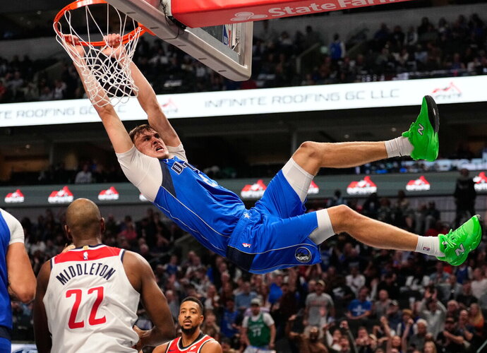 C.Flaggas apšyla kojas NBA (Scanpix nuotr.)