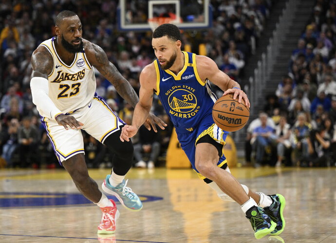 LJamesas ir S.Curry rengė įspūdingus pasirodymus (Scanpix nuotr.)