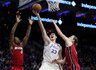E.Ilyasova suerzino D.Wade'ą (Scanpix nuotr.)